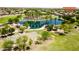 Aerial view of the community, showcasing the park and surrounding homes at 22500 N Greenland Park Dr, Maricopa, AZ 85139