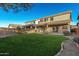 Well-maintained backyard with a lush lawn, ideal for Gathering activities and entertaining at 22500 N Greenland Park Dr, Maricopa, AZ 85139