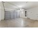 Spacious two car garage, with garage door and water heater at 2363 W Dusty Wren Dr, Phoenix, AZ 85085