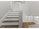 Staircase featuring wood-look flooring at 2363 W Dusty Wren Dr, Phoenix, AZ 85085
