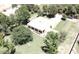 Aerial view of the home showcasing mature landscaping, large yard, and an outdoor patio area at 25722 S 179Th St, Queen Creek, AZ 85142