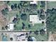 Aerial view of a home with a large lot, pool, surrounding trees, and landscaping at 25722 S 179Th St, Queen Creek, AZ 85142
