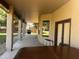 Covered back patio with barbecue, outdoor seating, and views of the landscaped backyard at 25722 S 179Th St, Queen Creek, AZ 85142