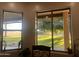 Tranquil backyard view with lush landscaping, mature trees, and a sunny atmosphere at 25722 S 179Th St, Queen Creek, AZ 85142