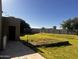 Large backyard featuring a building and mature trees, enclosed by block wall for privacy at 25722 S 179Th St, Queen Creek, AZ 85142
