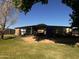 Exterior view of horse barn and stalls, providing ample space for animal care at 25722 S 179Th St, Queen Creek, AZ 85142