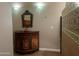 Charming bathroom features a unique vanity, decorative tile accents, and elegant sconce lighting at 25722 S 179Th St, Queen Creek, AZ 85142
