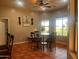 Cozy breakfast nook with views of the backyard and a stylish chandelier at 25722 S 179Th St, Queen Creek, AZ 85142