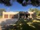 Charming single-story home with a stucco exterior, three-car garage, and well-maintained landscaping at 25722 S 179Th St, Queen Creek, AZ 85142
