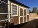 Exterior view of wooden outbuilding or shed with functional doors and window at 25722 S 179Th St, Queen Creek, AZ 85142