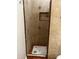 Beautiful tile shower showcasing decorative tile accents and built-in niche for toiletries at 25722 S 179Th St, Queen Creek, AZ 85142