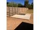 Outdoor horse training area featuring concrete pad and sturdy metal gate at 25722 S 179Th St, Queen Creek, AZ 85142