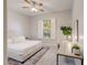 Inviting bedroom with large window, plush carpeting, and stylish decor at 2623 E Indigo Pl, Chandler, AZ 85286