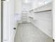 Bright, spacious walk-in closet with custom shelving and plenty of room for organization at 2623 E Indigo Pl, Chandler, AZ 85286