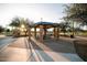 Covered picnic area provides shade and seating for outdoor gatherings in a community park at 2623 E Indigo Pl, Chandler, AZ 85286