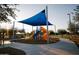 A colorful playground with slides and climbing structures is shaded for safe, fun outdoor play at 2623 E Indigo Pl, Chandler, AZ 85286