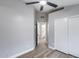 Bedroom with view to bathroom, closet and laminate flooring throughout at 2730 E Desert Trumpet Rd, Phoenix, AZ 85048