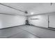 Spacious garage with concrete floor and new water heater at 2730 E Desert Trumpet Rd, Phoenix, AZ 85048