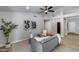 Stylish living room with high ceilings, modern furnishings, and ample natural light at 2730 E Desert Trumpet Rd, Phoenix, AZ 85048