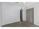 Comfortable bedroom showcasing plush carpeting, an open closet and well-lit walls at 3030 S Rogers --, Mesa, AZ 85202