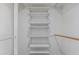 Custom closet with adjustable shelving and rod, maximizing storage space for clothes and accessories at 3030 S Rogers --, Mesa, AZ 85202