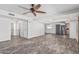 Bright and airy living room features new flooring, modern ceiling fan, and open floor plan at 3030 S Rogers --, Mesa, AZ 85202