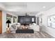 Bright living room featuring contemporary decor, a sleek entertainment center and comfortable seating at 3030 S Rogers --, Mesa, AZ 85202
