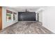Living room with new flooring, abundant natural light, a modern ceiling fan, and access to backyard at 3030 S Rogers --, Mesa, AZ 85202