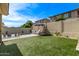 Beautiful backyard with artificial turf and in-ground pool at 3128 E Tina Dr, Phoenix, AZ 85050