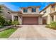 Beautiful two-story home with a spacious driveway, neat landscaping, and convenient two-car garage at 3128 E Tina Dr, Phoenix, AZ 85050