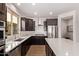 Gourmet kitchen with stainless steel appliances, large sink, and modern finishes at 3128 E Tina Dr, Phoenix, AZ 85050