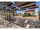 Community playground featuring shaded seating, slides, and play structures in a well-maintained area at 3128 E Tina Dr, Phoenix, AZ 85050