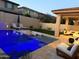 Inviting backyard pool and entertainment area with covered seating and lounge chairs at 3128 E Tina Dr, Phoenix, AZ 85050