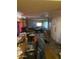 Spacious living room featuring plenty of space and a dog at 318 N 83Rd Pl, Mesa, AZ 85207