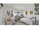 Cozy bedroom featuring a comfortable armchair, guitar, and decor at 3345 E University Dr # 47, Mesa, AZ 85213