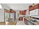 Kitchen with stainless steel refrigerator, granite countertops, and eat-in breakfast area at 3345 E University Dr # 47, Mesa, AZ 85213
