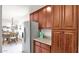 Updated kitchen featuring stainless steel refrigerator, abundant cabinetry, and a breakfast area at 3345 E University Dr # 47, Mesa, AZ 85213