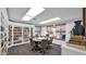 Community library with bookshelves, seating area, and natural light at 3345 E University Dr # 47, Mesa, AZ 85213