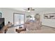 A comfy living room is furnished with neutral colors and lots of natural light at 3345 E University Dr # 47, Mesa, AZ 85213
