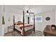 A primary bedroom with a four poster bed, ceiling fan, and a large dresser at 3345 E University Dr # 47, Mesa, AZ 85213