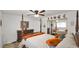 Spacious bedroom boasts a four-poster bed, dresser, and ample closet space at 3345 E University Dr # 47, Mesa, AZ 85213