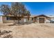 Charming single-story home featuring a tan exterior, tidy landscaping, and a single-car garage at 3562 W Seldon Ln, Phoenix, AZ 85051