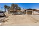 Charming single-story home featuring a tan exterior, tidy landscaping, and a single-car garage at 3562 W Seldon Ln, Phoenix, AZ 85051