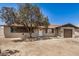 Charming single-story home featuring a tan exterior, tidy landscaping, and a single-car garage at 3562 W Seldon Ln, Phoenix, AZ 85051
