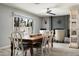 Cozy dining room area with elegant furnishings and fireplace, perfect for Gathering dinners at 3759 E Charter Oak Rd, Phoenix, AZ 85032