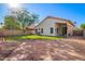 Spacious backyard with a brick patio, green lawn, and a well-maintained exterior at 4515 E Verbena Dr, Phoenix, AZ 85044