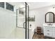 Well-designed bathroom with a sleek glass shower, modern fixtures, and a vanity at 4515 E Verbena Dr, Phoenix, AZ 85044