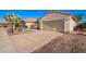 Charming single-story home featuring a two-car garage and low-maintenance desert landscaping at 4515 E Verbena Dr, Phoenix, AZ 85044