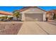 Charming single-story home featuring a two-car garage and low-maintenance desert landscaping at 4515 E Verbena Dr, Phoenix, AZ 85044