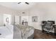 Large bedroom with ensuite bathroom, hardwood floors, and relaxing natural light at 4515 E Verbena Dr, Phoenix, AZ 85044